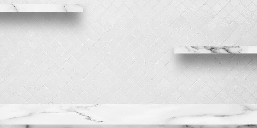 white-marble-table-with-decorative-interior-white-ceramic-room-wall-background-1